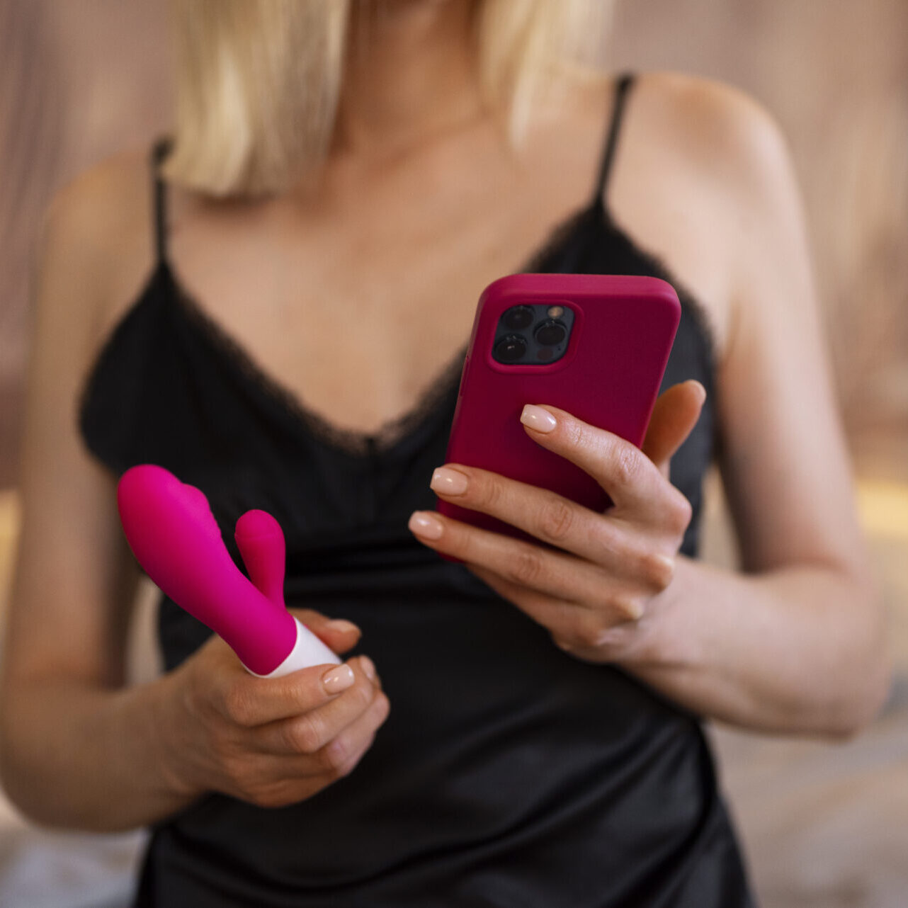 front-view-woman-with-smartphone-vibrator